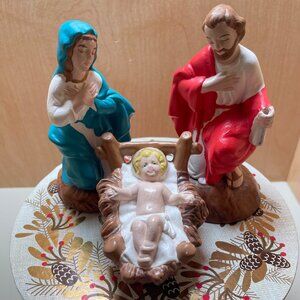 Vintage HOMCO Nativity set featuring Mary, Joseph, and Baby Jesus.